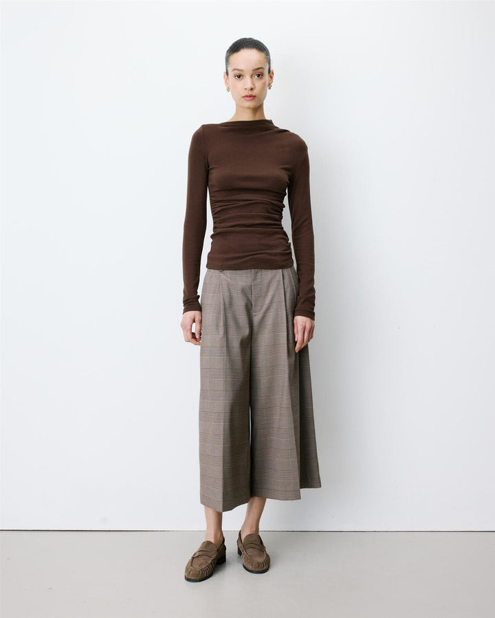 Aurygny Long sleeve asymmetric draped top