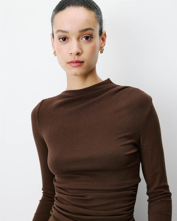 Aurygny Long sleeve asymmetric draped top