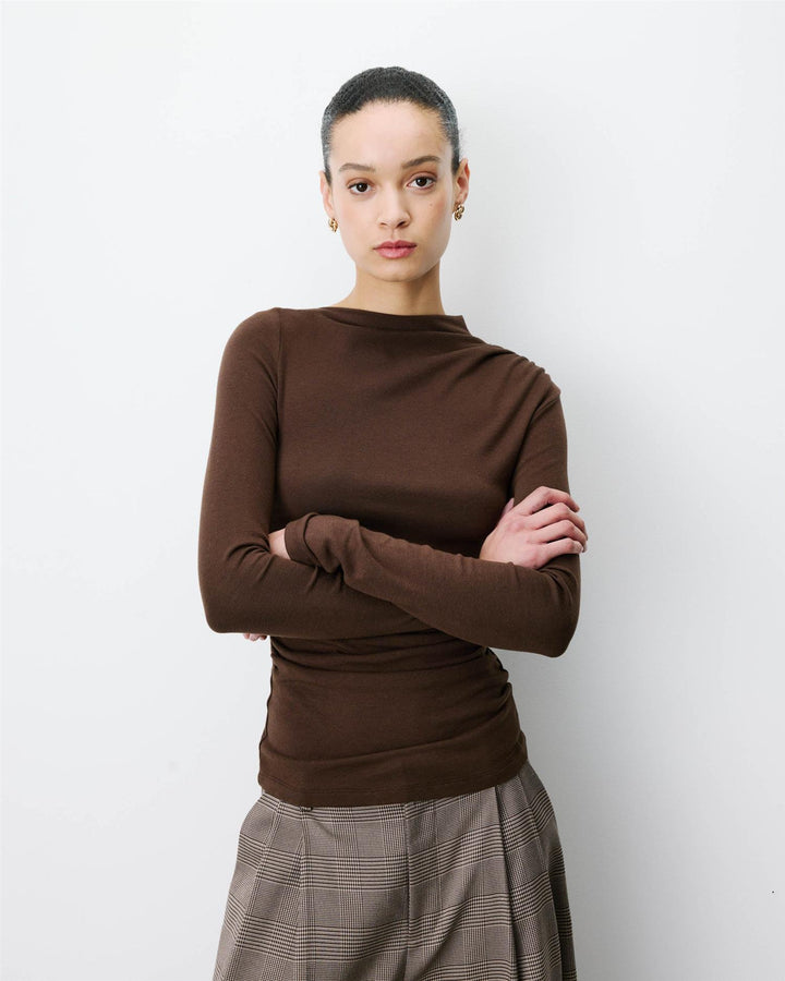 Aurygny Long sleeve asymmetric draped top