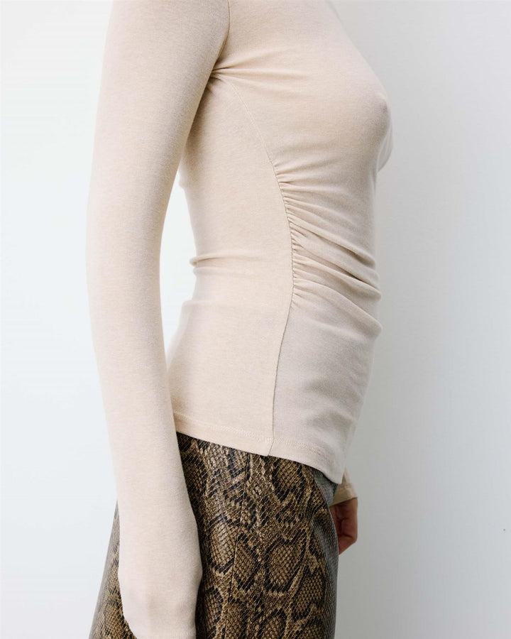 Aurygny Long sleeve asymmetric draped top