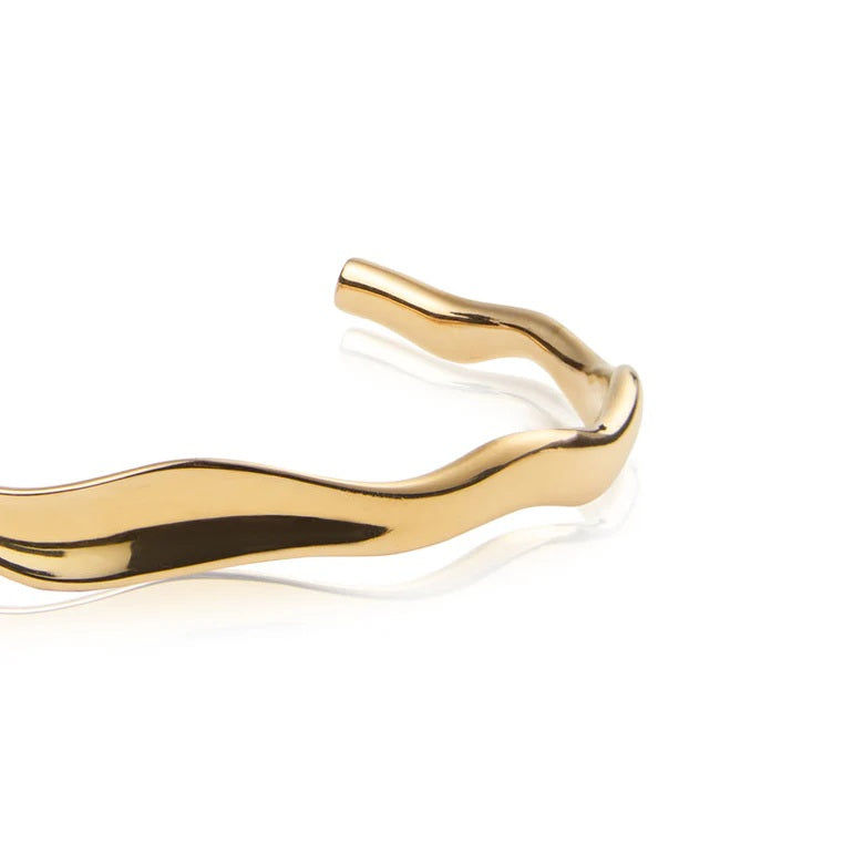 Wavy bolded cuff gold bracelet