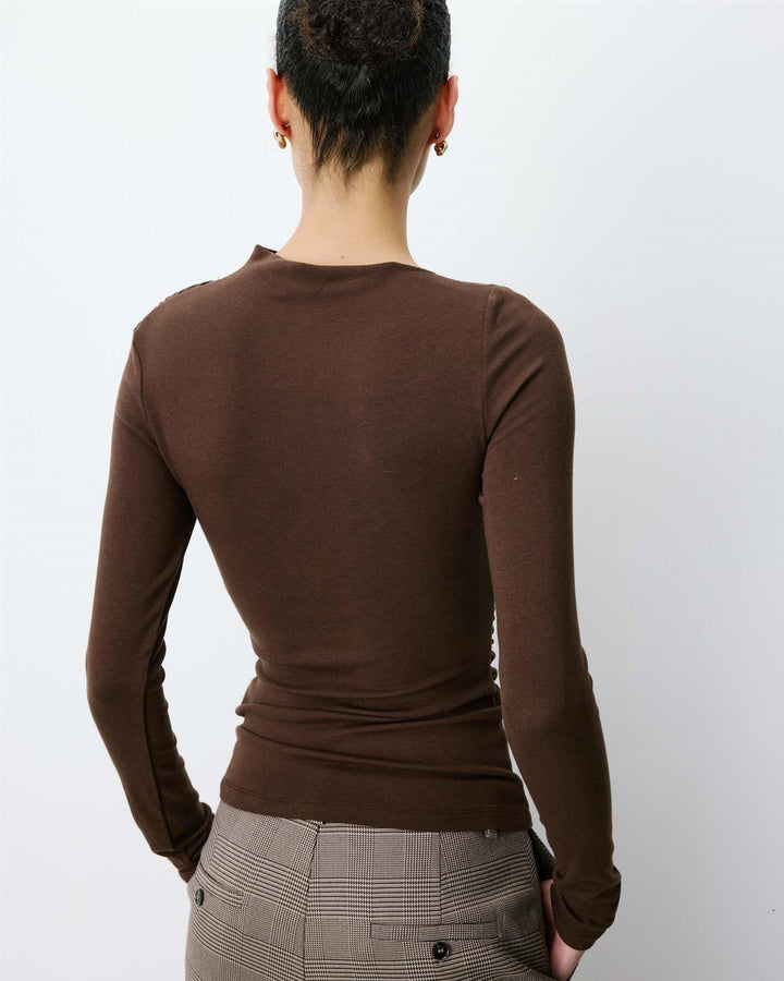 Aurygny Long sleeve asymmetric draped top