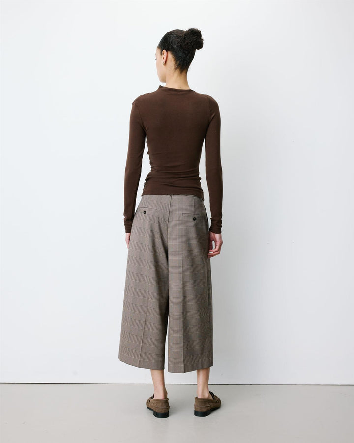 Aurygny Long sleeve asymmetric draped top